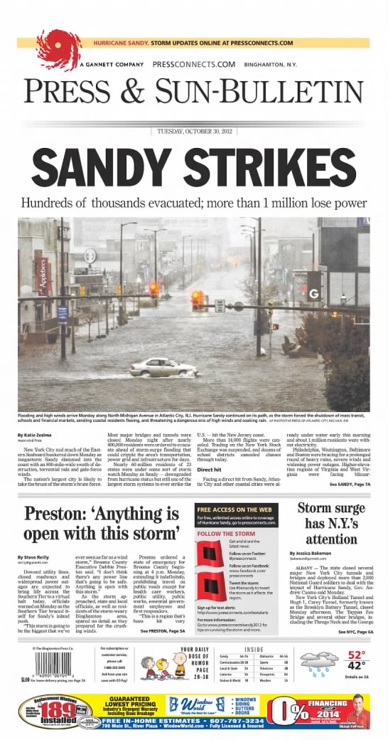 Newspaper front page with coverage and photo from 2012's Hurricane Sandy - 