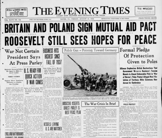 Newspaper front page headlines about Britain and Poland signing a mutual assistance pact - 