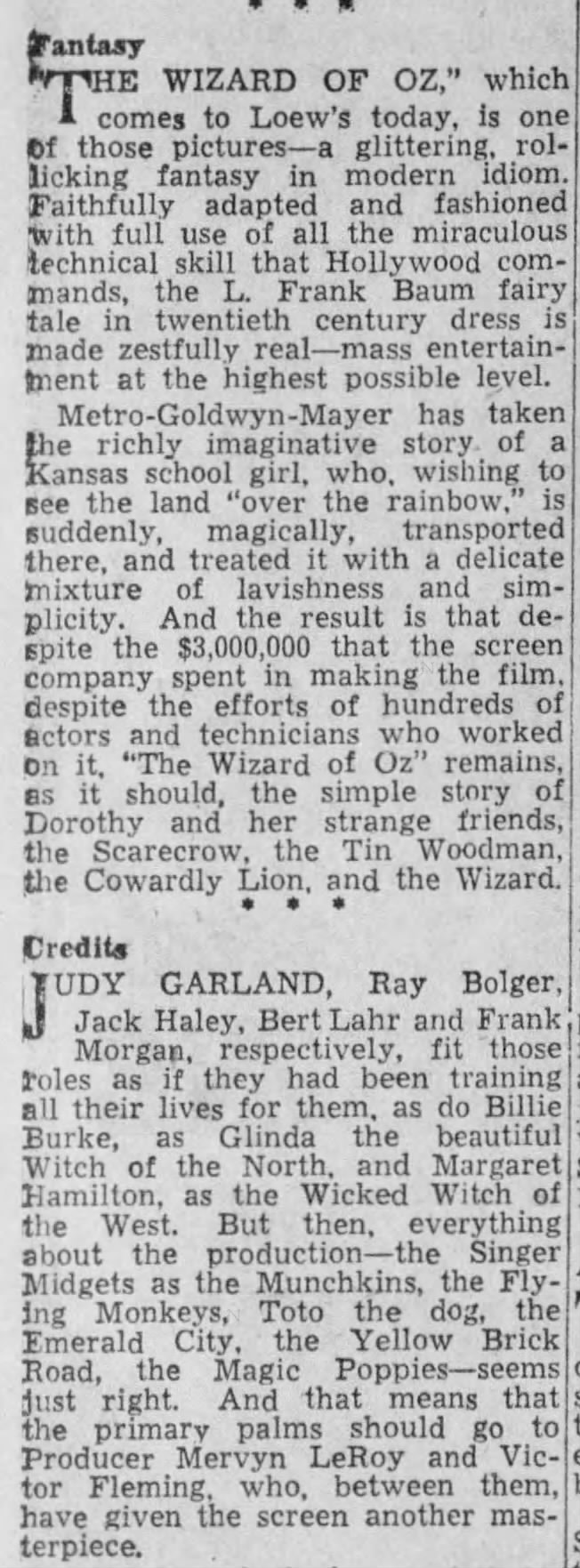 Wizard of Oz is "a glittering, rollicking fantasy in modern idiom"