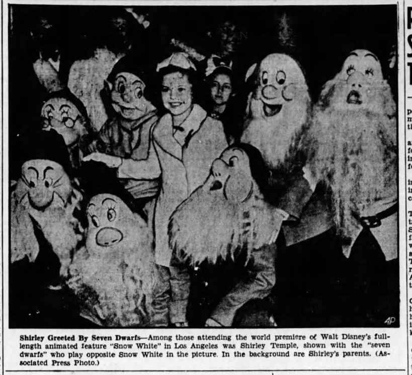Shirley Temple greet by the Seven Dwarfs at Hollywood premiere of "Snow White"