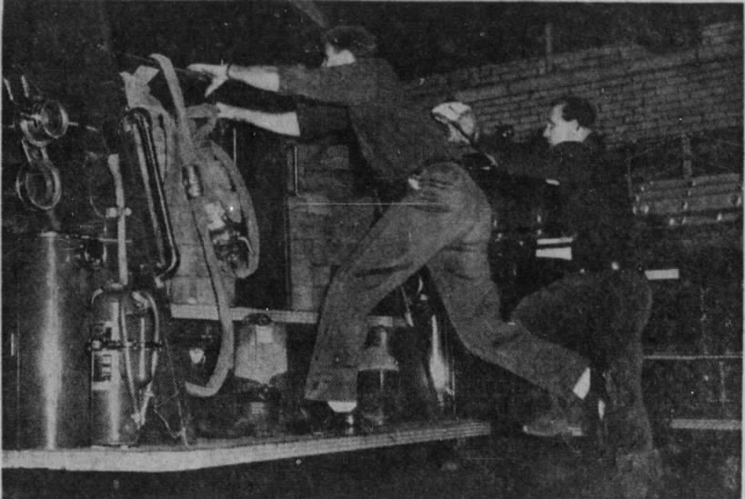 1953 - firemen jumping on the tailboard for a run