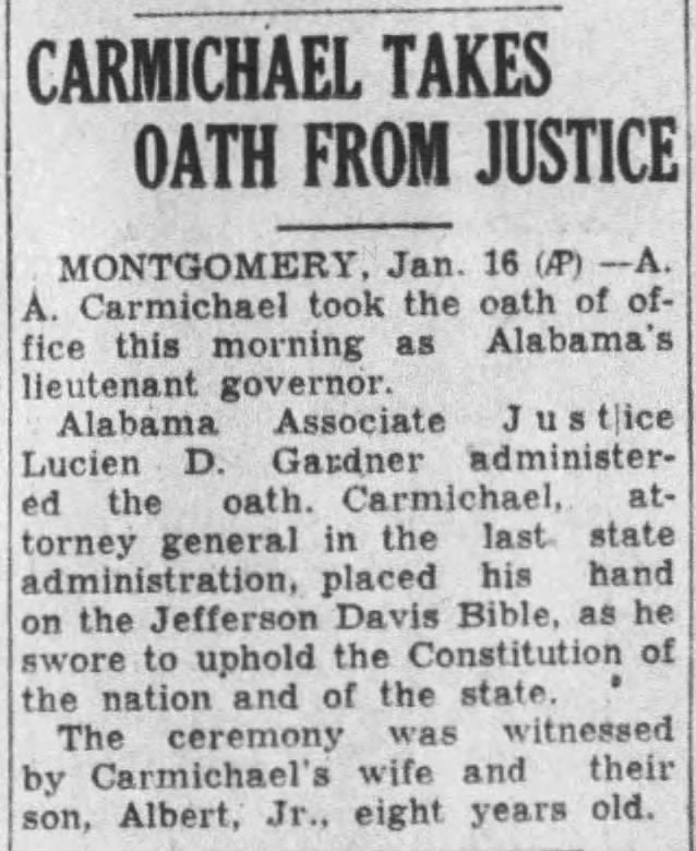 Carmichael Takes Oath from Justice