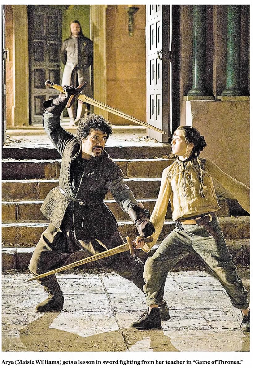 Arya learning to fight, photo from 2011 review of the Game of Thrones TV debut