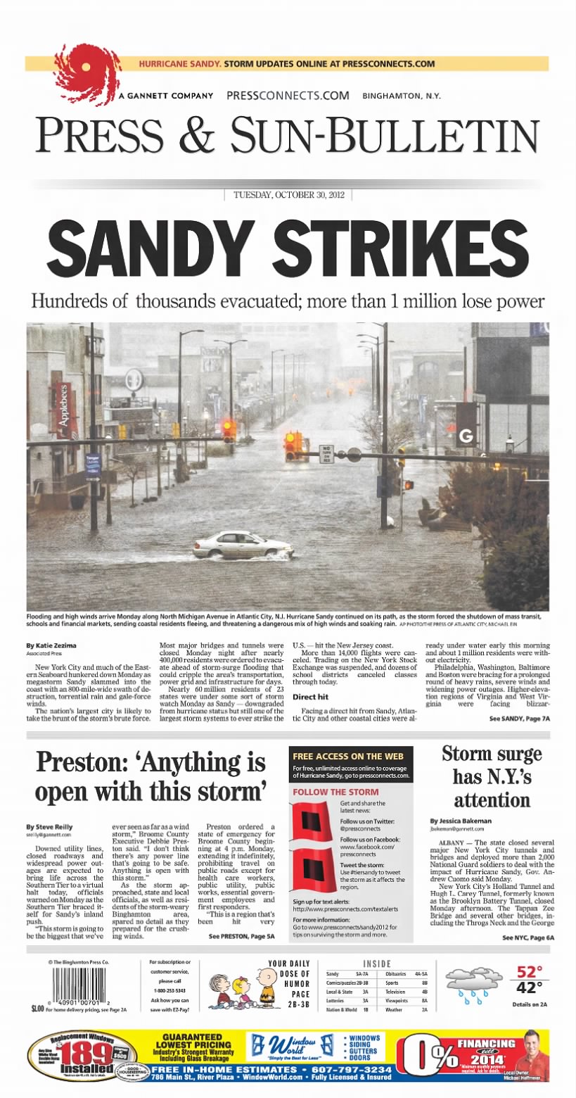 Newspaper front page with coverage and photo from 2012's Hurricane Sandy