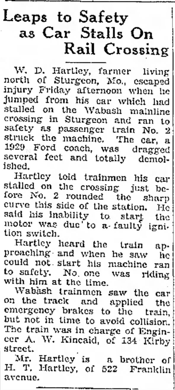 W D Hartley escaped injury when his car stalled on the railroad crossing in Sturgeon Feb1932