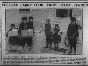 Photograph of children carrying food from a relief station after the 1917 Halifax Explosion