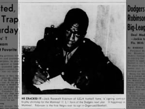 Photo of Jackie Robinson signing with the Montreal Royals in 1945